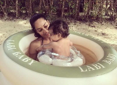 Lisa Haydon gives first swim lesson to her baby boy