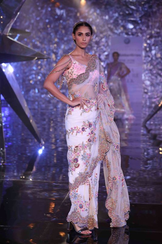 Models walk for Suneet Varma in India Couture Week