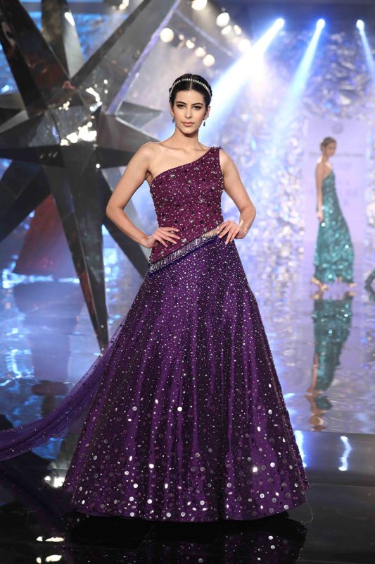 Models walk for Suneet Varma in India Couture Week