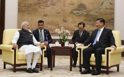 Narendra Modi, Xi Jinping meet in Wuhan, exchange views on solidifying bilateral relationship