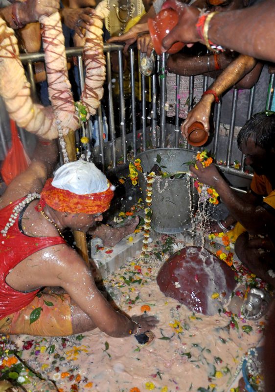 People gather in large numbers at temple for Maha Shivaratri