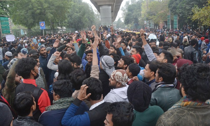 Students agitating against Citizenship Amendment Act  outside Jamia Millia Islamia University.