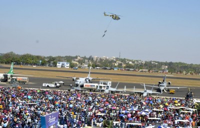 Visitors witness the last day of Aero India Show