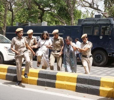 Members of All India Democratic Women's Association protest against clean chit to CJI 
