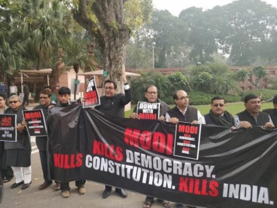 Opposition parties protest against BJP government outside parliament