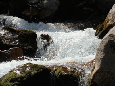 Man tries to cross overflowing river, washed away