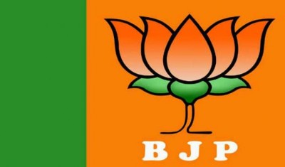 Oppositions complaint to EC over 'BJP' been written under lotus symbol on EVMs