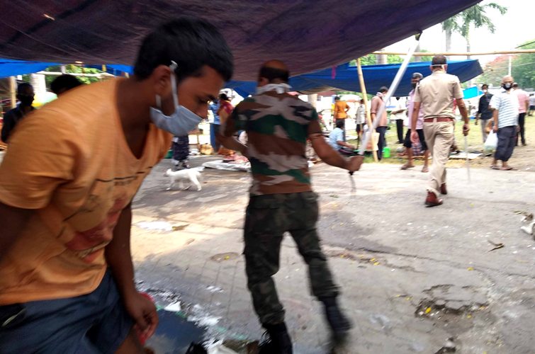 BSF supervises a market during lockdown in Kolkata