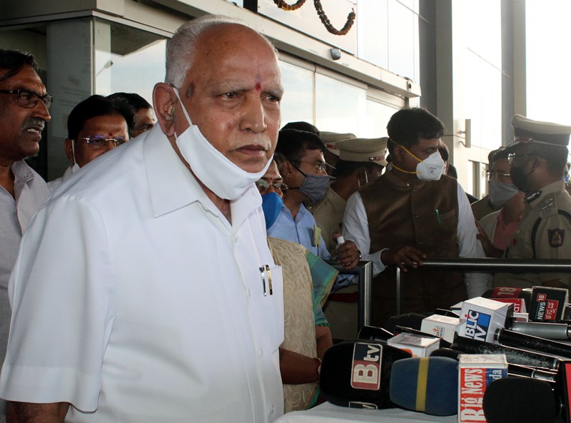 Karnataka CM B S Yeddyurappa speaks to media persons at Sambra Airport in Belagavi