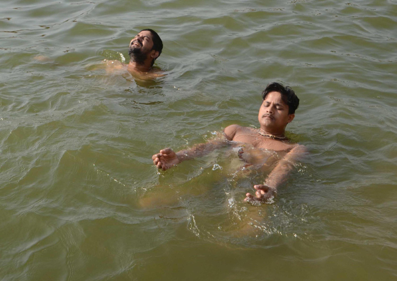Varanasi: People practise Yoga on Ganges ghat