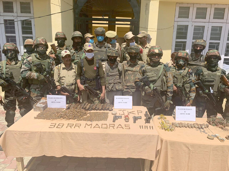 Joint teams of police and army recover cache of arms