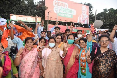 NDA workers celebrate party victory in Bihar Assembly elections in Patna