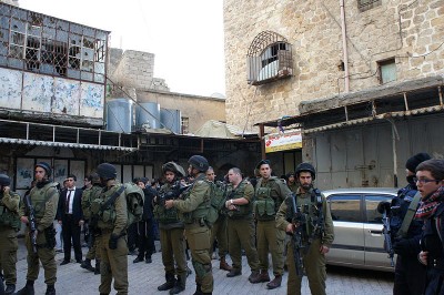Two Israeli soldiers wounded, 14 Palestinians arrested in West Bank