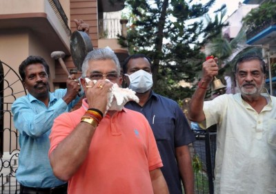 IndiaFightsCorona: West Bengal BJP chief Dilip Ghosh blows conch shell 