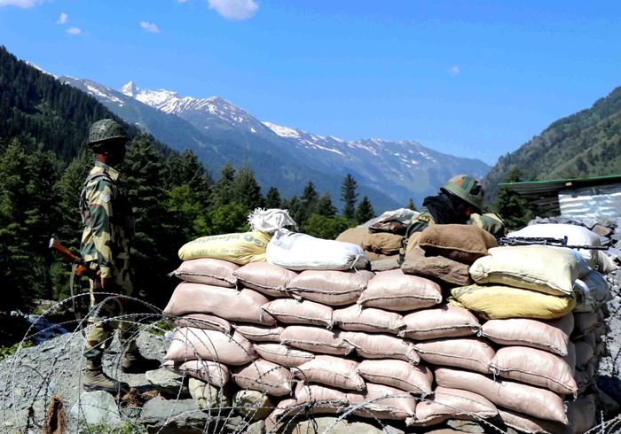 BSF soldiers guarding Indian troops moving to Galwan Valley in Ladakh on  Srinagar-Leh national highway 