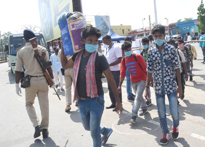 Stranded migrant workers return homes in special trains