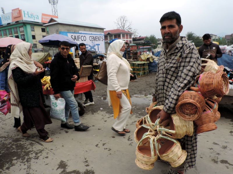 Vendors sell traditional Kashmiri firepot 'Kangri' in Srinagar