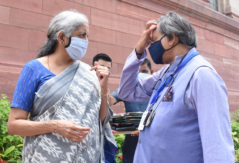 Nirmala Sitaraman and Shashi Tharoor interacts during Monsoon Session