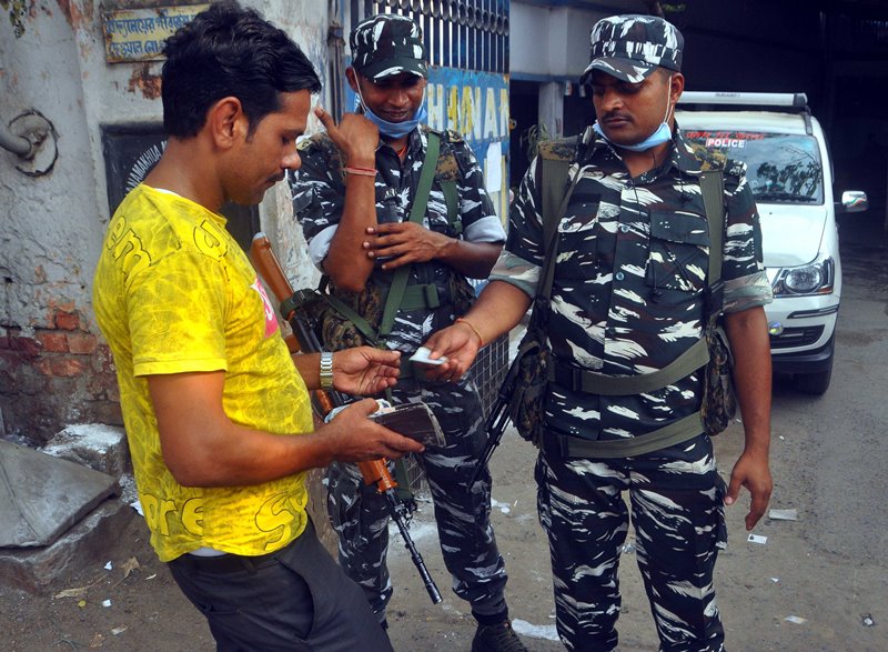 Voters waiting in queue at Thakurpukur polling station in Kolkata during Bengal Assembly Elections