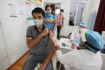 Youth receives COVID-19 vaccine