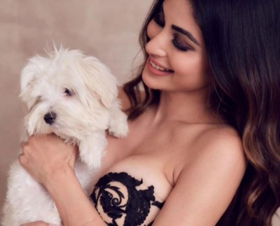 Do you know what Mouni Roy's 'happy place' is?