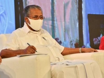 Kerala CM requests people to use double masks