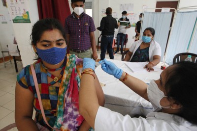 Woman receives COVID19 vaccine