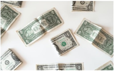 Rupee down 18 paise against USD