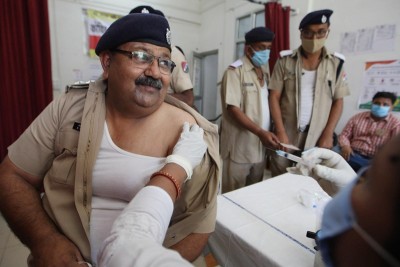 Officer receiving COVID-19 vaccine in Prayagraj