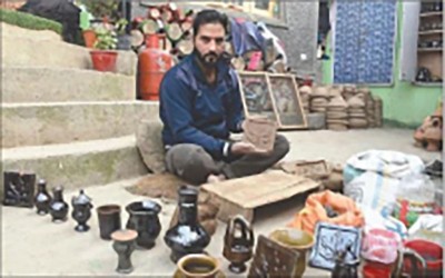 Srinagar youth strives to revive Kashmir's 'dying' glazed pottery art