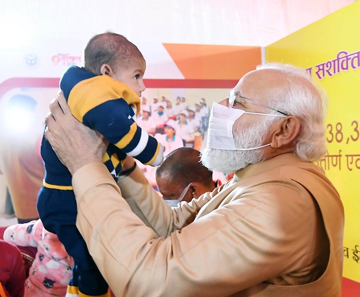 PM Modi participates in a programme in UP's Prayagraj attended by lakhs of women