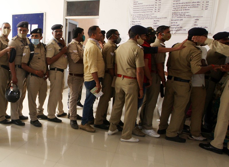 Officer receiving COVID-19 vaccine in Prayagraj