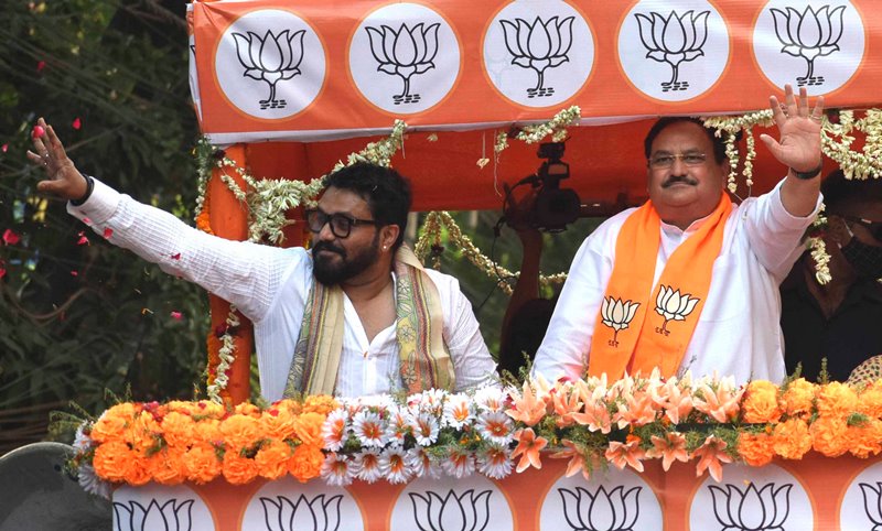 J P Nadda waving supporters during road show for Babul Supriyo in Kolkata
