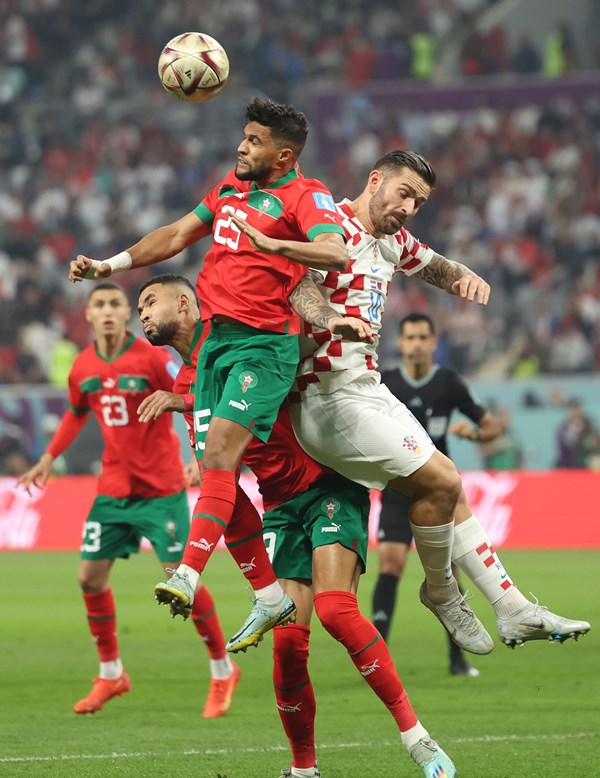 Achraf Dari of Morocco celebrates his goal with teammates during third place play-off match