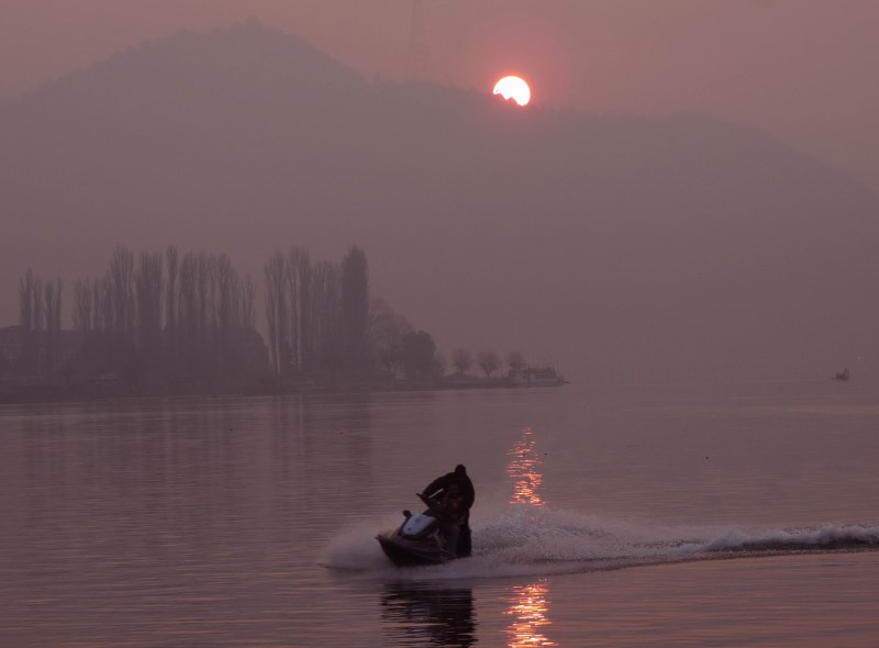People enjoy last sunset of 2023 in Srinagar