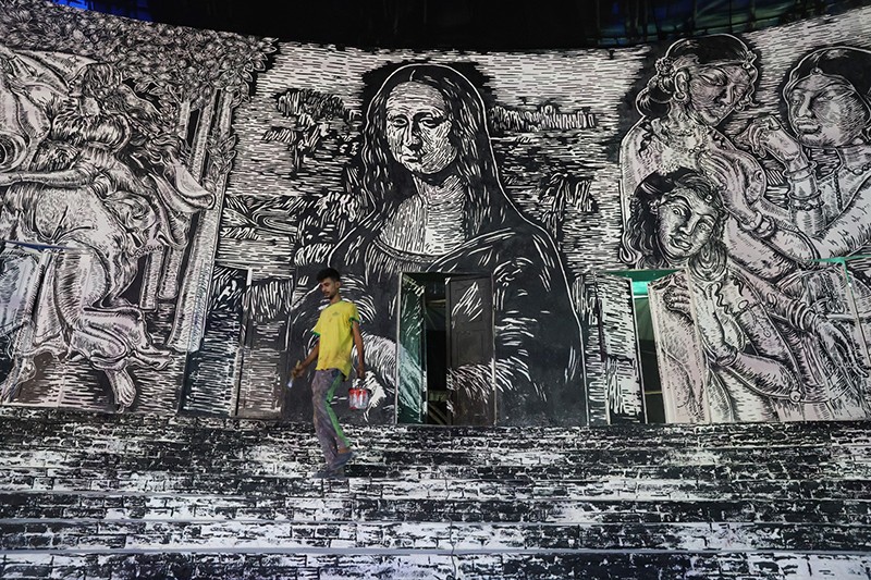 In Images: Kolkata artisan crafts Durga Puja pandal highlighting acid attack survivors’ rights