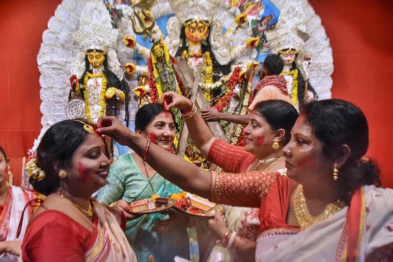 In Images: Devotees in Kolkata  bid farewell to Goddess Durga with sindoor khela and immersion on Vijayadashami