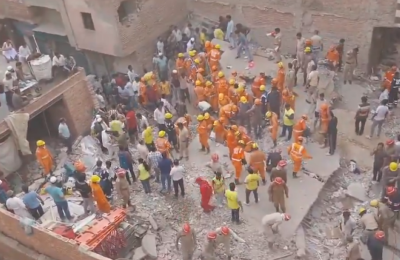 Four dead after building collapses in Delhi, many still feared trapped under debris