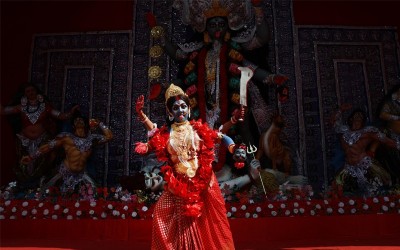In Images: Dancers perform before Goddess Kali at a pandal in Kolkata