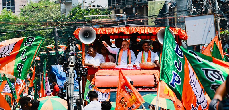 In Images: Amit Shah holds roadshow for BJP candidates in Kolkata