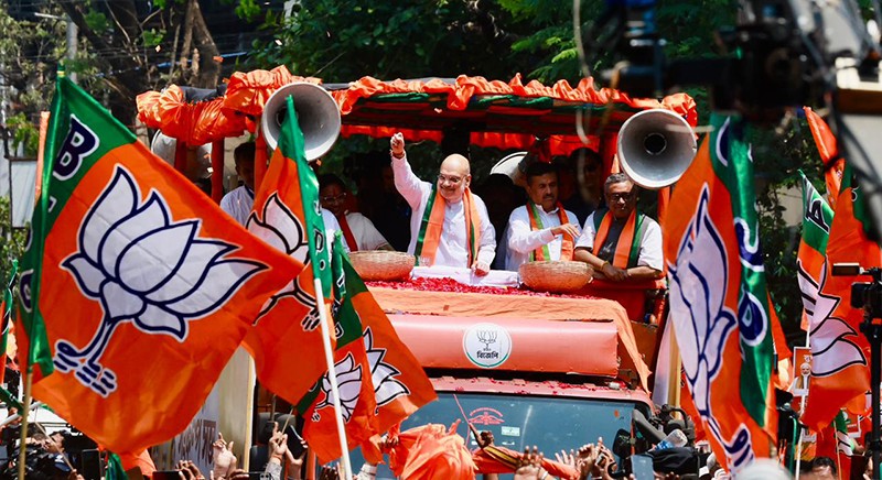 In Images: Amit Shah holds roadshow for BJP candidates in Kolkata