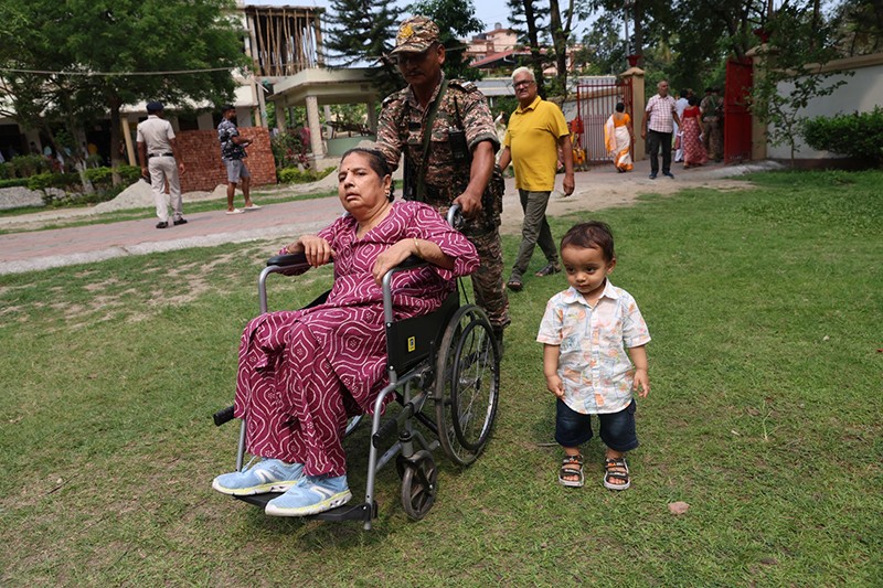 Security steps in as Siliguri votes: Disabled voter assisted in North Bengal polling