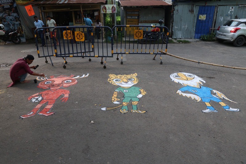In Images: Kolkata artist celebrates global football icons with vibrant street murals
