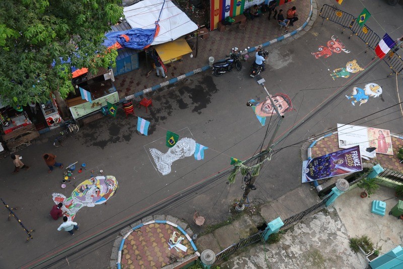 In Images: Kolkata artist celebrates global football icons with vibrant street murals