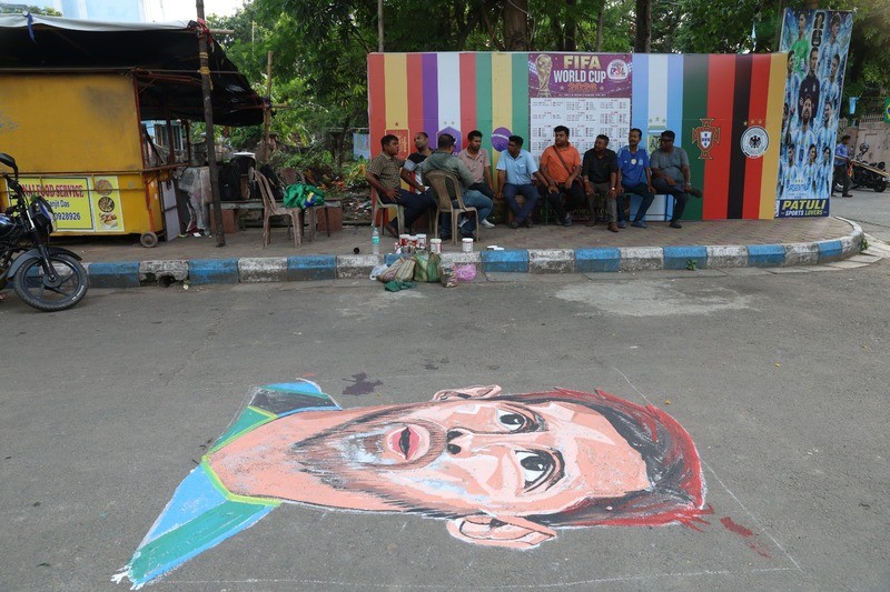 In Images: Kolkata artist celebrates global football icons with vibrant street murals