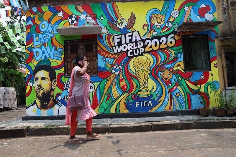 In Images: Children in Kolkata play beneath a giant World Cup masterpiece
