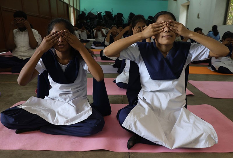 Visually impaired students of a Kolkata blind school embrace yoga ahead of Yoga Day