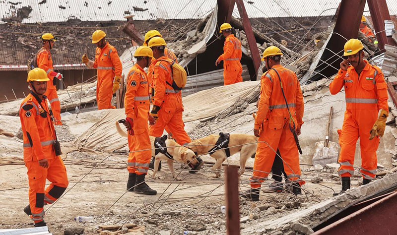 In Images: NDRF, Army intensify search as more bodies recovered from Taratala godown collapse site