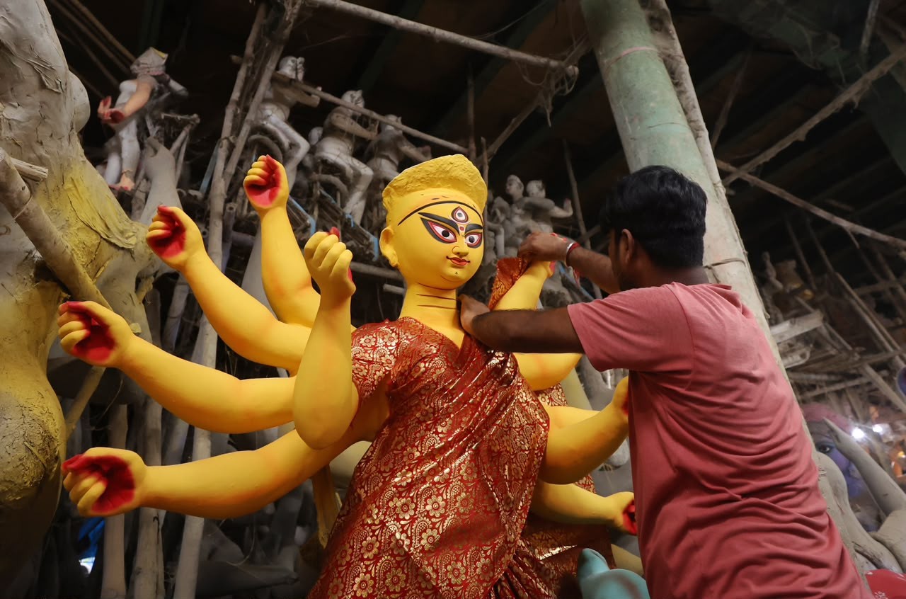 In Images: Durga Puja artisans give final touches to idols as Kolkata gears up for the festivities