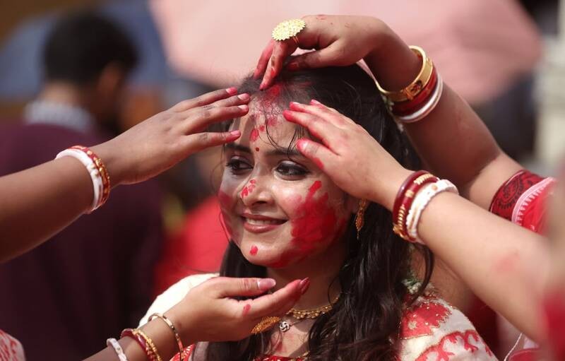 In Images: Sindoor Khela, idol immersion mark Bijoya Dashami in Kolkata